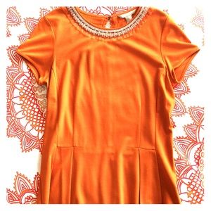 Beaded Neck Peplum Top